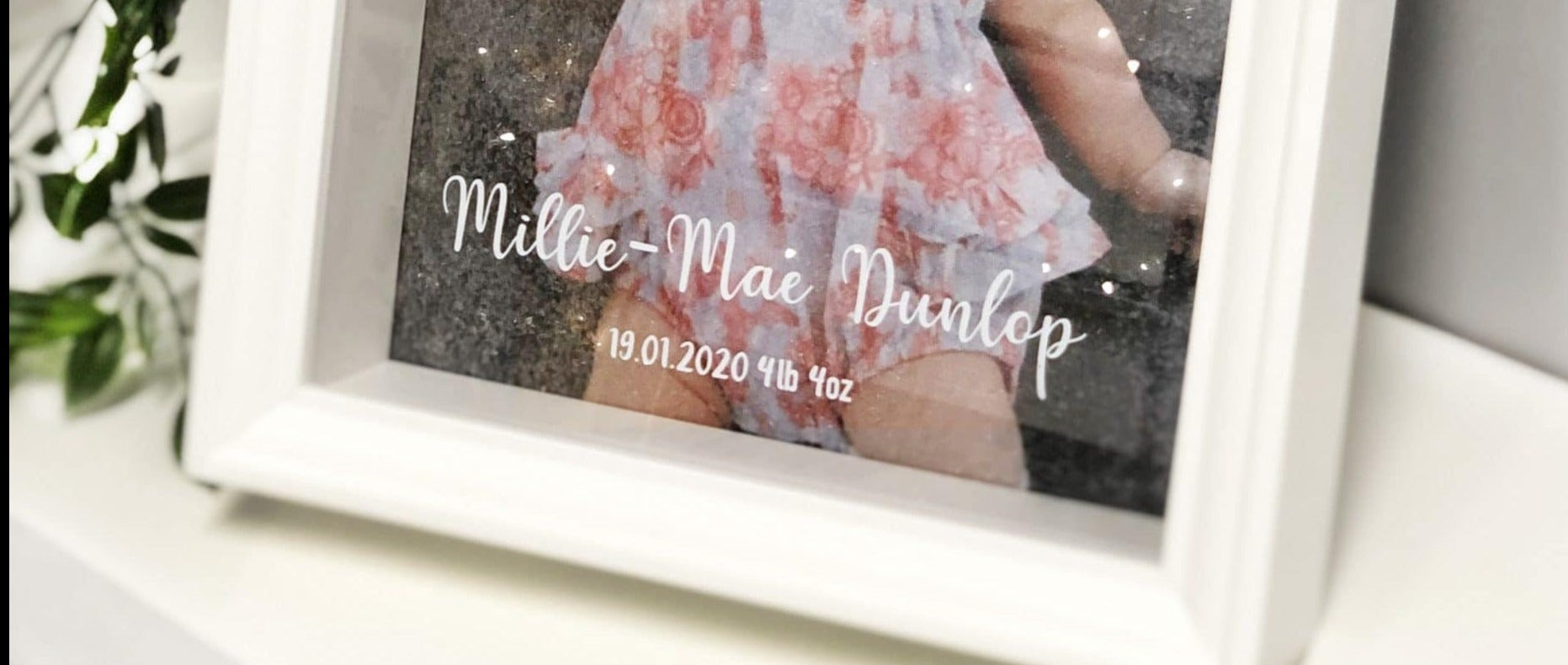 canvas baby photo in picture frame front view with details printed on acrylic
